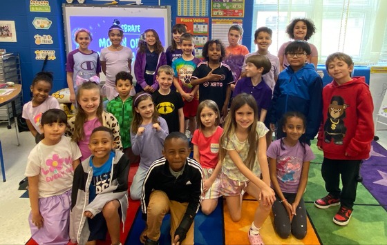 Students and staff wearing purple to honor military students