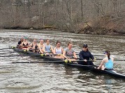 Melanie rowing with Madison crew team