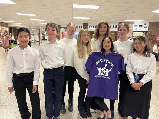 Sixth grade all county chorus members pose together