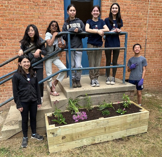 Student and troop create butterfly garden in Woodson dining area