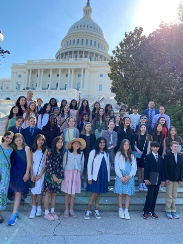 Students standing in front of U.S. Capitol