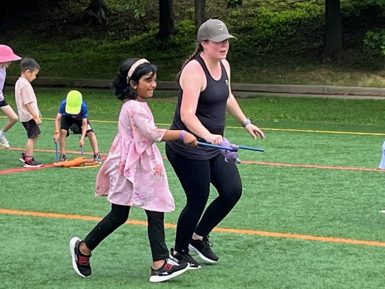 teacher and student at field day
