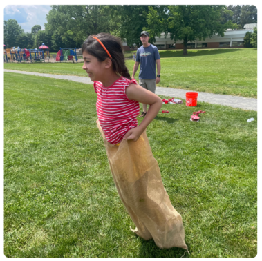 picture of student in the potato sack race