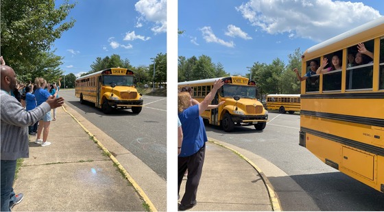Staff waving goodbye to students on the buses