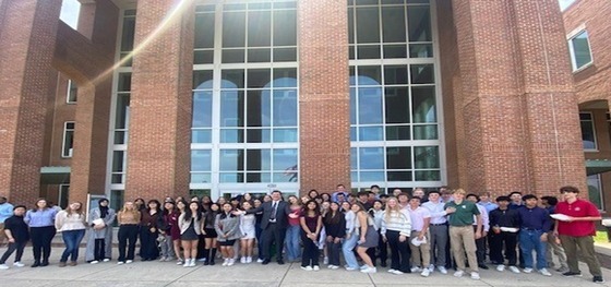 Students standing in front of Fairfax County Courthouse