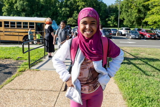 Smiling Student posing for first day photo