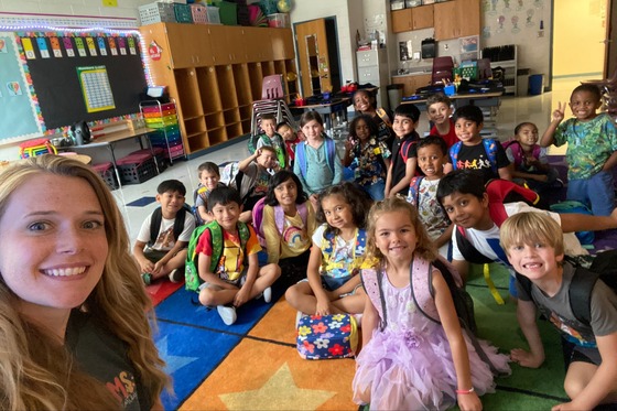 A first grade class ready to go home after a great first day