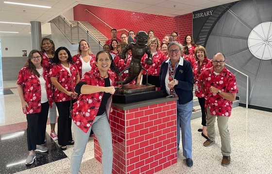 staff at Herndon smile for a photo