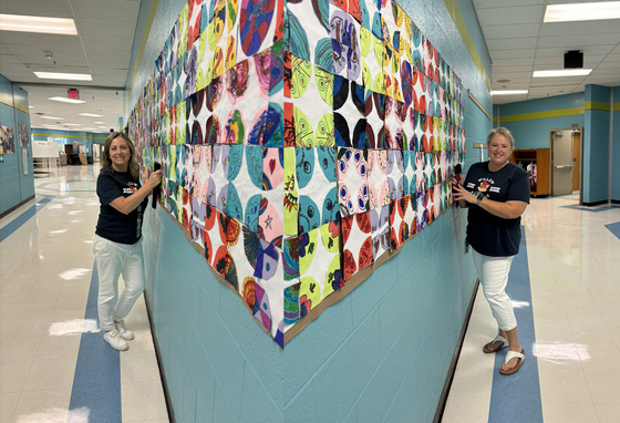 Student art work was used to create colorful paper quilts on display in the halls.