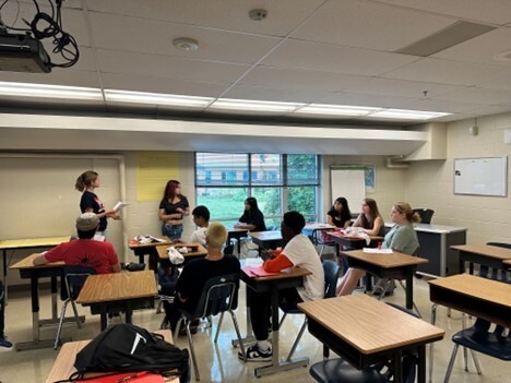 Students sitting at desks in a classroom