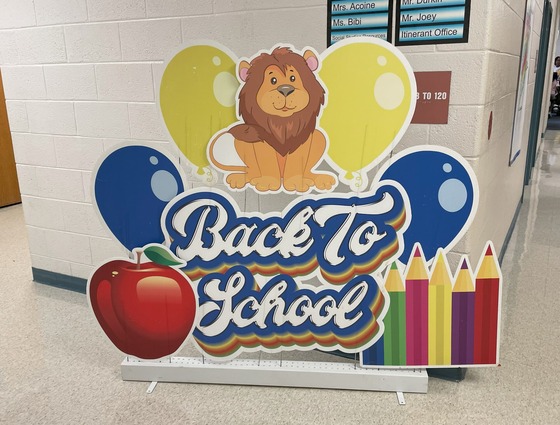 Welcome Back to School sign with lion