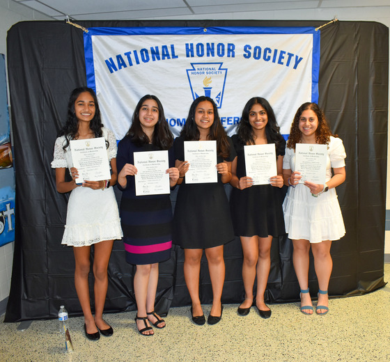 Inductees from 2023 ceremony posing with their certificates