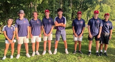 Golf team poses while playing against Fairfax HS Golf