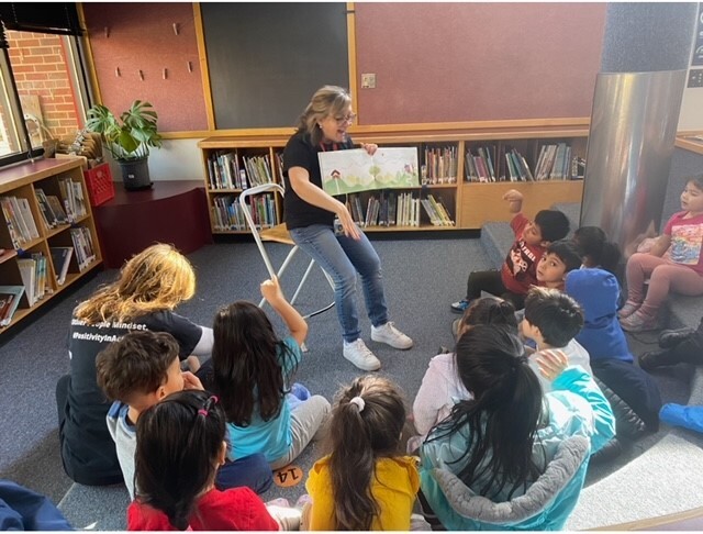 library teacher with students