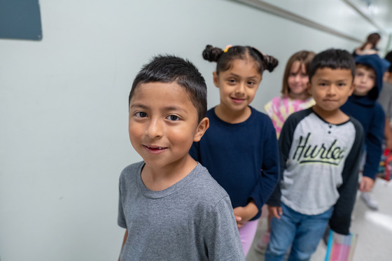 1st grade students lined up in the hall 