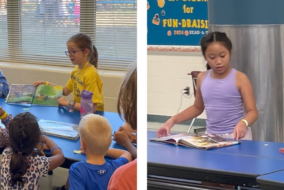 Student reading to student and student reading her own book