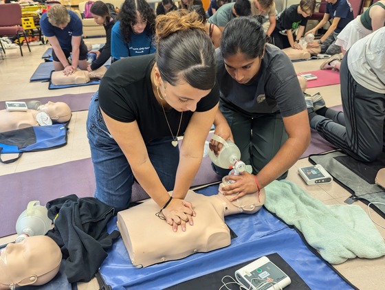 Students practicing CPR