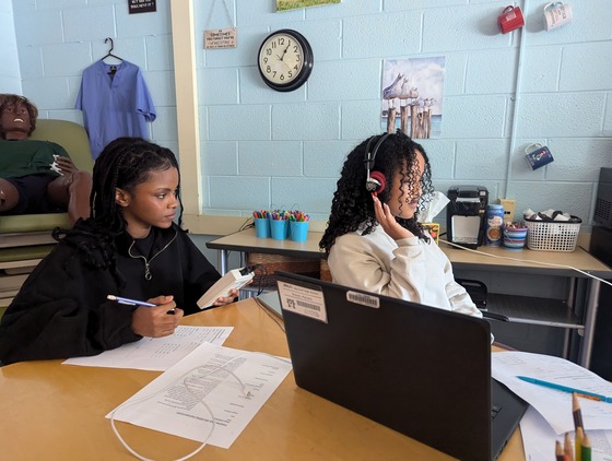 students practicing hearing screenings