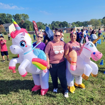 Principal Salata, Assistant Principal Younger, and Lisa Gibson ready for the Unicorn Race.