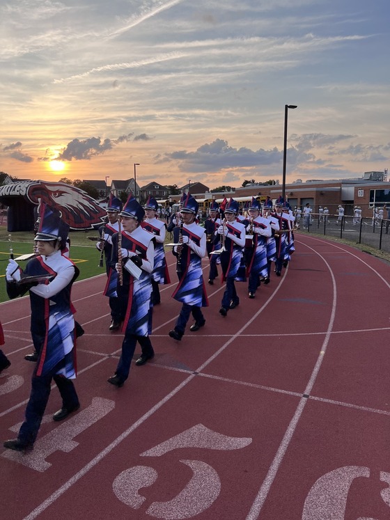 Marching band walking on the track