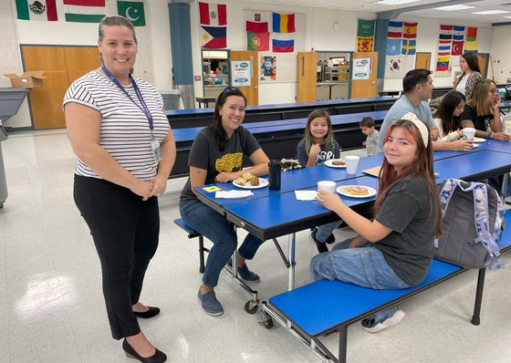 Military families having breakfast at school