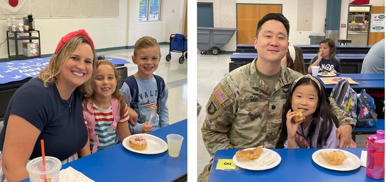 Military families having breakfast at school