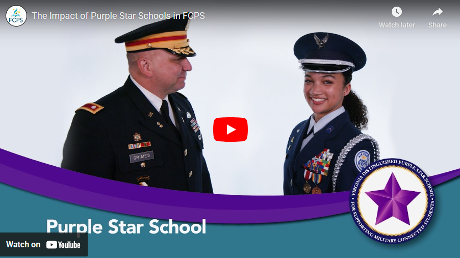 Military father smiling at JROTC daughter while both wear their uniforms