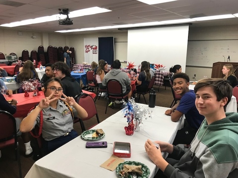 students sitting at a table