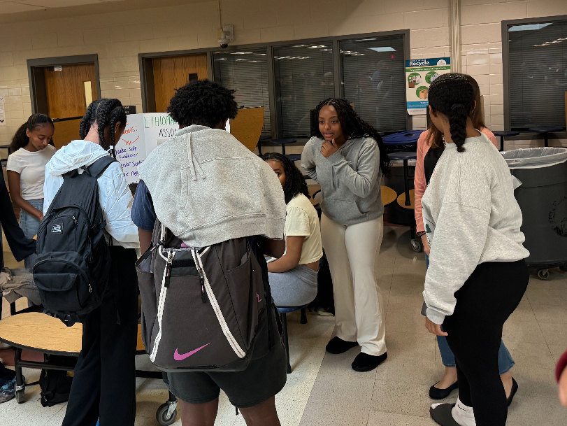 students standing and talking in a group