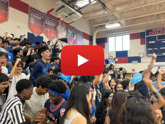 Picture of Homecoming with YouTube play button to view the highlight video