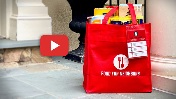 Food For Neighbors Red Bag on a Porch with a "Red Play Video" button.