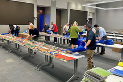 A team from Capital One supporting FCPS students with a donation of school supplies and backpacks.