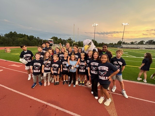 Clermont students pose in future eagle Edison HS t-shirts.