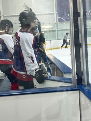 Ice Hockey player prepares to get on the ice