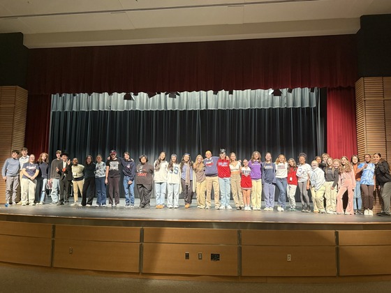 Students lined up on the stage