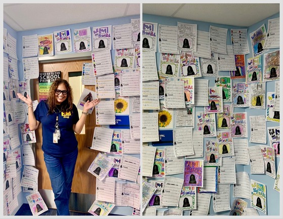 Mrs. Crews surrounded by notes from students.