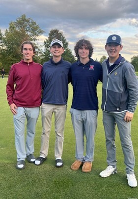 Golfers pose for another picture