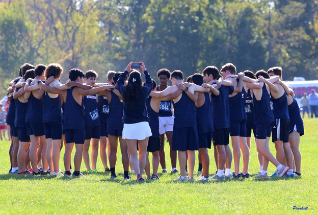 Boys Cross Country huddle up before a race