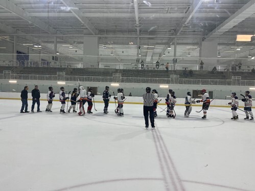 Ice Hockey showing sportsmanship to the opposing team