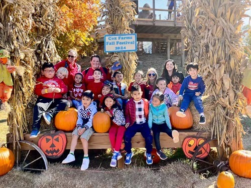 Children with their class and pumpkins