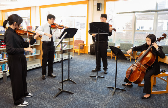 Strings Quartet performing at the reception before the Rededication Ceremony