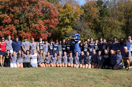 Cross Country team poses for group picture at the District Meet