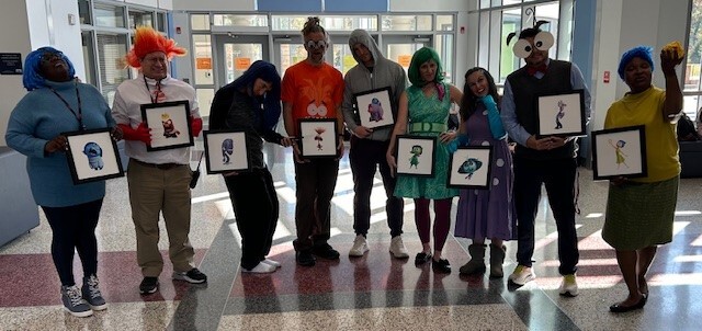 The TJ Administration dressed as characters from Inside Out for Halloween