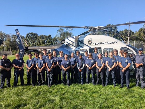 EMT students stand by police helicopter