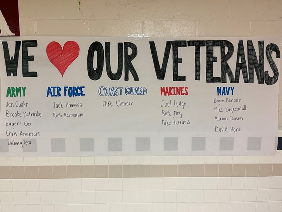 We Love Our Veterans banner in Woodson hallway