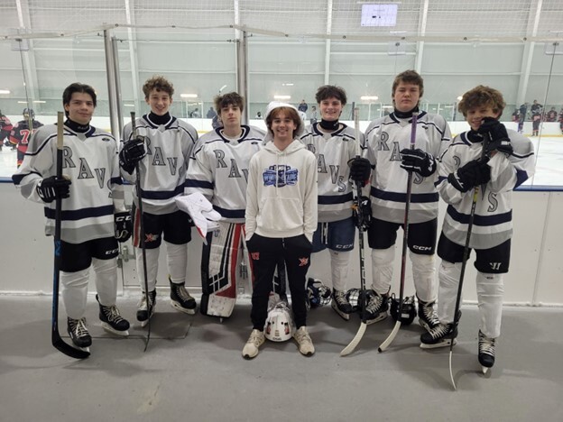 Ice Hockey players showing off their new player-designed jerseys