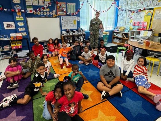 Military parents visiting with students in the classroom