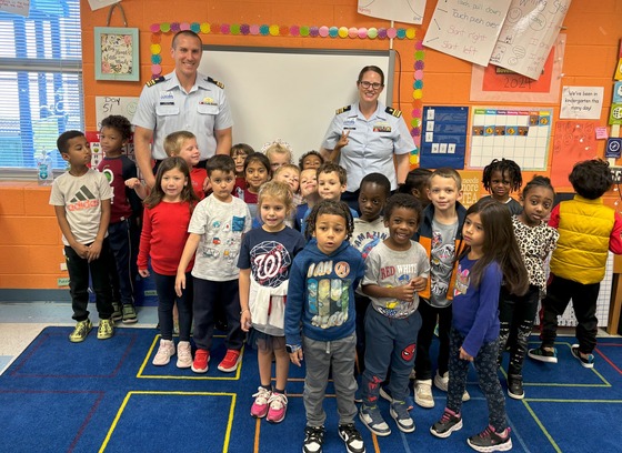 Military parents visiting with students in the classroom