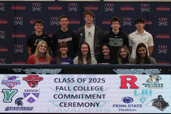 Fall College Commitment Ceremony athletes pose for group picture