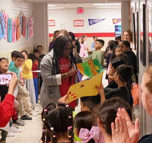 Principal with students